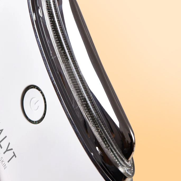 Close-up of the Dermalyt Pro LED Gua Sha sculpting edge